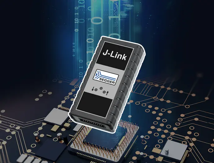 An electronic device labeled "J-Link" by SEGGER is depicted, designed for programming and debugging applications. It hovers above a circuit board background, which features various chips and electrical patterns, emphasizing its technological purpose in electronics.