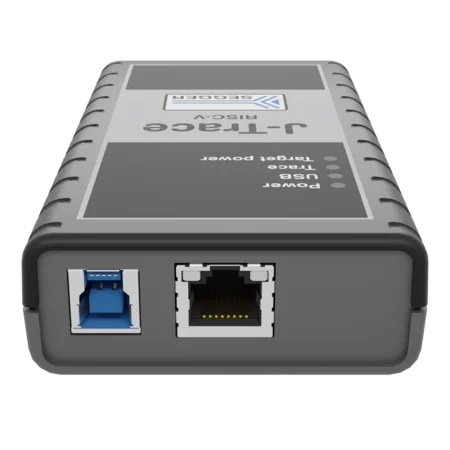 A rectangular electronic device featuring a USB port and an Ethernet port. The device is labeled with the name "1-Trace" and includes indicator lights and power labels. It has a textured surface and rounded corners, designed for easy handling.