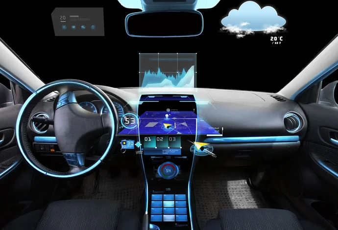 A futuristic car interior features a digital dashboard with augmented reality displays. Displays show speed, navigation maps, and weather information. The steering wheel has controls, and ambient lighting enhances the modern design. The dashboard highlights various data graphics for driving assistance.