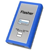 A handheld device labeled "Flasher" from SEGGER, primarily gray with blue rubber edges. It features three status indicators: "Ready" (OK), "Not ready," and "Fail," along with a "PROG" button. This device is used for programming and debugging electronics.