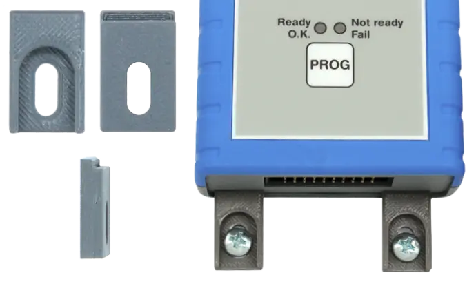 Four separate clamp blocks on the left, two mounting clips mounted to a Flasher on the right