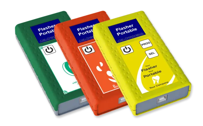 Three colorful portable flashers are displayed: a green one on the left, an orange one in the middle, and a yellow one on the right. Each device features a power button and various symbols, indicating different functions. The text "Flasher Portable" is prominently displayed on each device.