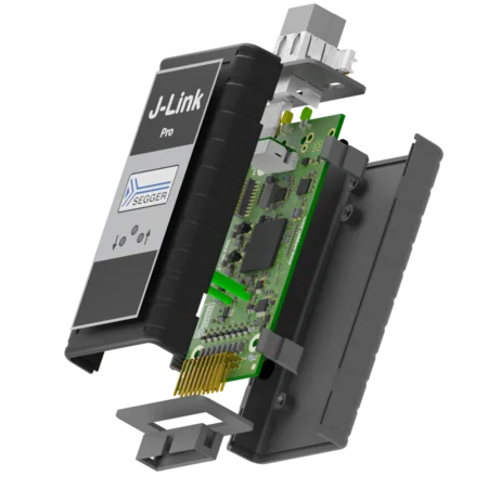 An exploded view of a J-Link Pro device, showcasing its internal circuit board, connectors, and components. The casing is shown partially open, revealing the electronics inside. The device is primarily black with a white label indicating its brand, SEGGER.