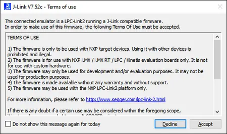 A dialog box titled "Terms of Use" for J-Link V7.52c outlines the conditions for using the firmware. It specifies that the firmware is for NXP target devices only, intended for development and evaluation purposes, not for production, and includes disclaimers about warranty and support. Options to "Decline" or "Accept" are provided.