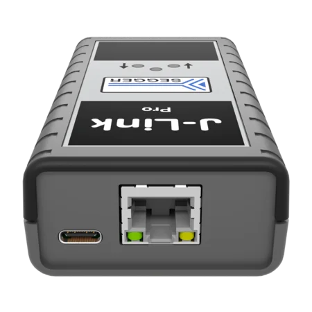 A gray device with a black top label reads "Seagate 1-Link Pro." It features indicator lights and a USB-C port on one side. An Ethernet port with two colored indicators is also visible. The design is compact, with a rugged texture along the edges.