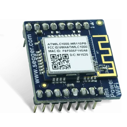 This image shows a compact electronic module featuring a blue circuit board with multiple connectors. At the center, it has a white label displaying "ATWML C1000-MR410PB" alongside various identification codes and a QR code. The module is designed for wireless communication.