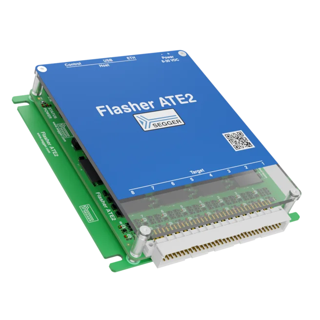 The image features the Segger Flasher ATE2, a programming and debugging device. It has a blue top with labeled ports for control and power, mounted on a green base with connectors for various electronic targets. The device is designed for efficient programming of embedded systems.