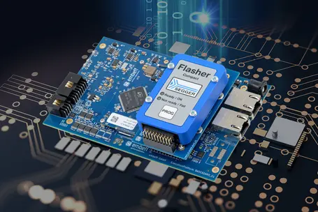 Hardware-in-the-loop programming with Flasher Compact Blie Flasher Compact mounted on board