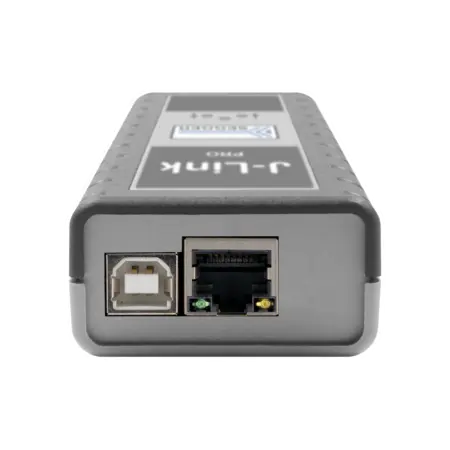 A gray device with ports on one end, labeled "J-Link Pro." It features a square USB port and an Ethernet port, both for connectivity. The surface has a textured design for grip. It is designed for programming and debugging electronic devices.