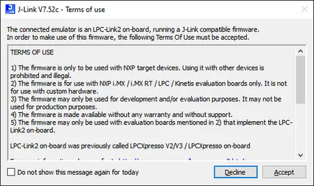 A software interface window displays "Terms of Use" for the J-Link emulator, indicating that the firmware is meant only for specific NXP evaluation boards and should not be used with other devices. It includes options to accept or decline the terms.