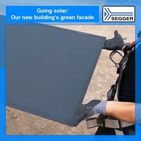 News graphic: Going solar: our new building's sustainable facade News graphic: Solar panel being held by construction worker