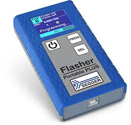 The image shows a blue handheld device called "Flasher Portable PLUS" designed for programming. It features a screen displaying programming information and three buttons labeled "PROG," "SEL," and a power symbol. The device is compact and has a textured grip for easy handling.