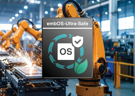 Image features industrial robots in a manufacturing setting, with sparks flying from metal processing. In the foreground, there's a logo for "embOS-Ultra-Safe," displaying the letters "OS" within a circular design, incorporating checkmarks and leaves, symbolizing safety and eco-friendliness.
