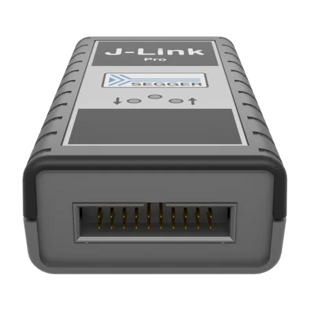 A J-Link Pro debug probe is shown, viewed from the front. It features a rectangular design with a connector at one end. The device has labels and a logo on its surface, indicating its brand and model. The overall color scheme is gray with a black textured edge.